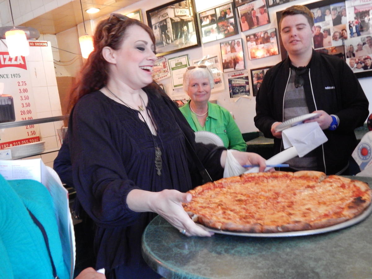 Our guide, with pizza from Joes.