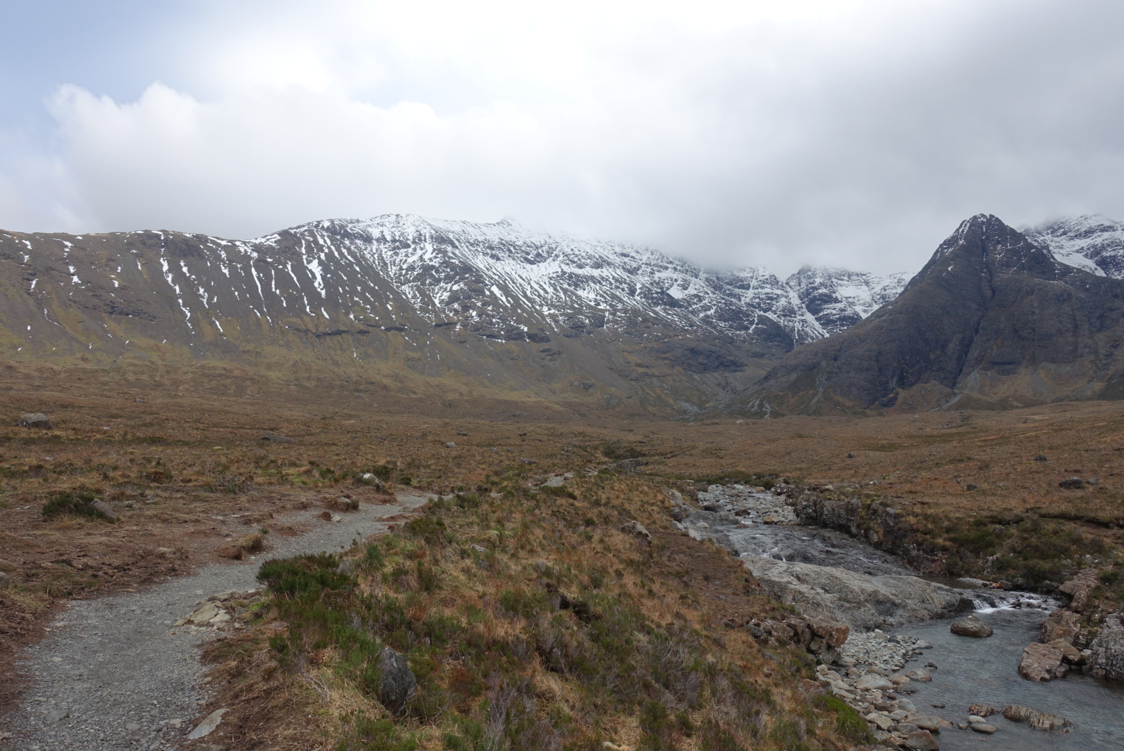 a mountain pass shrouded in cloud
