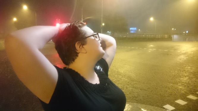 standing in the rain