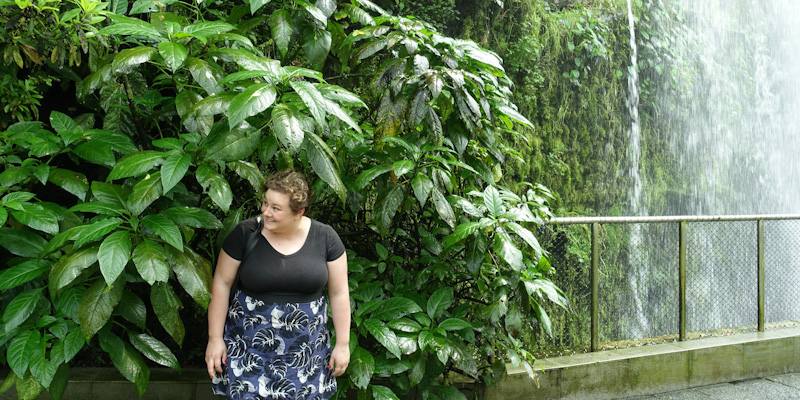 Grace takes shelter under a tree. Inside.